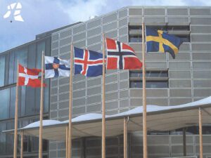 The interior of the Felleshus, the common house of the Nordic Embassies, featuring modern exhibition spaces.