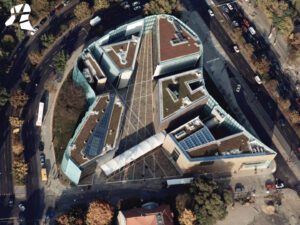 Aerial view of the Nordic Embassies showing the arrangement of the buildings and the connecting copper band.