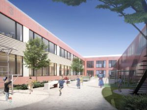 Twin courtyards providing outdoor learning and play spaces accessible directly from classrooms