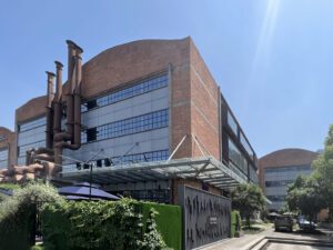 Facade of the Xintiandi Factory in Hangzhou, highlighting the blend of historic brickwork and modern glass elements