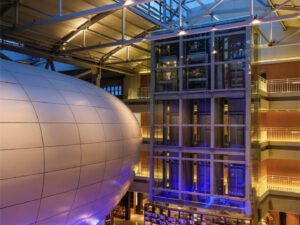 Two spherical conference rooms suspended within the central hall of the Xintiandi Factory