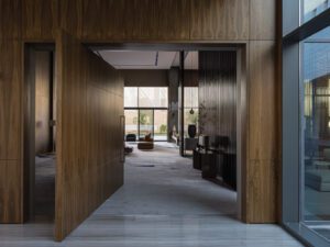 Rotating timber door showing interior of Masjid for Assila Investment HQ in Riad.