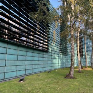 thumbnail with Green building facade for the Nordic Embassy in Berlin with trees and landscaping in front.